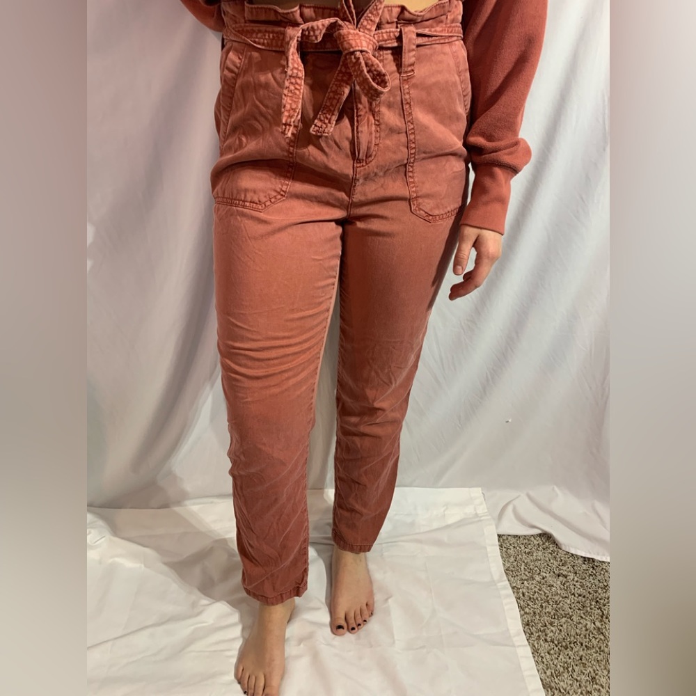 Maurice’s rust color paper bag waist pants with a belt. Ankle length, size 6.